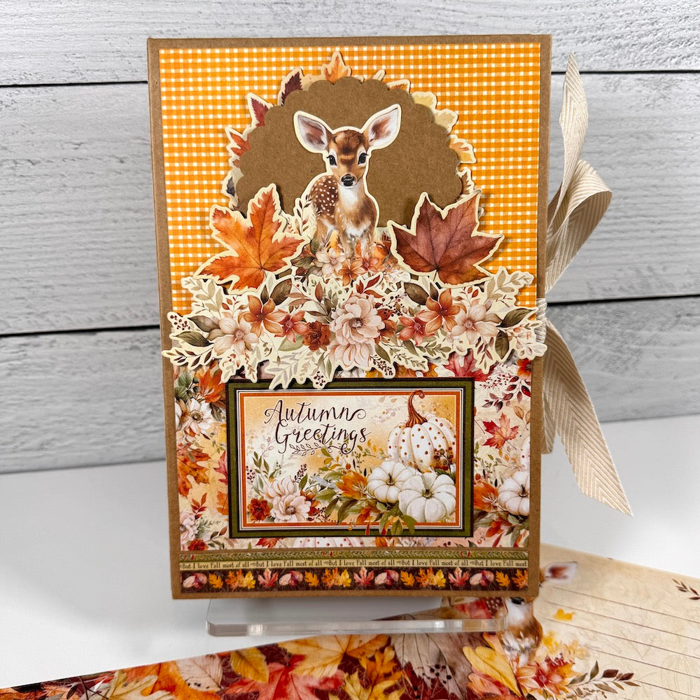 Autumn Greetings Scrapbook Album Kit with pretty fall leaves, flowers, pumpkins, and a baby deer