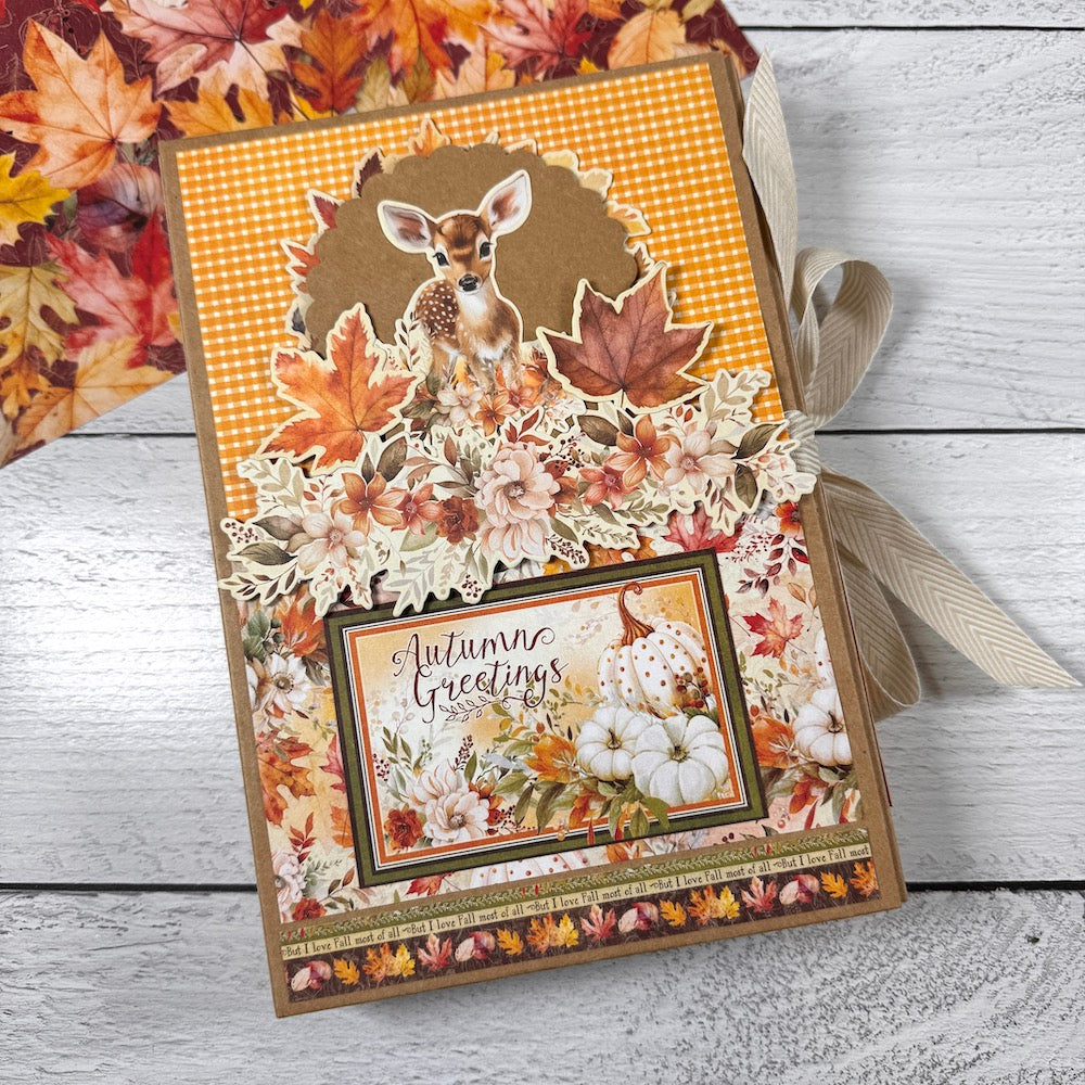 Autumn Greetings Scrapbook Album Kit with pretty fall leaves, flowers, pumpkins, and a baby deer