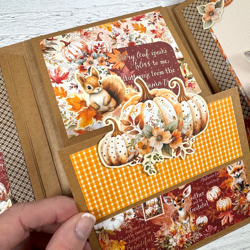 Autumn Greetings Scrapbook Album page with fall leaves, flowers, pumpkins, a cute squirrel