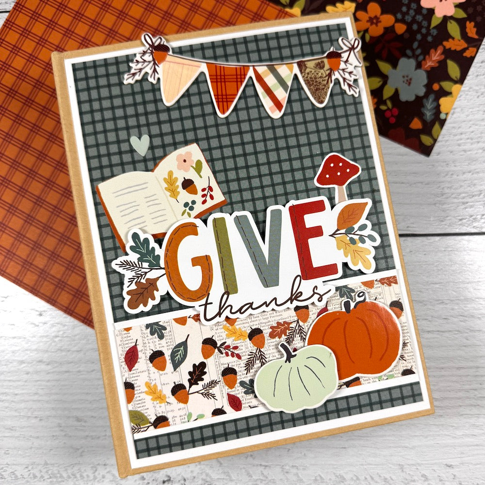 Give Thanks Fall Scrapbook Album with acorns, pumpkins, leaves, and an autumn banner