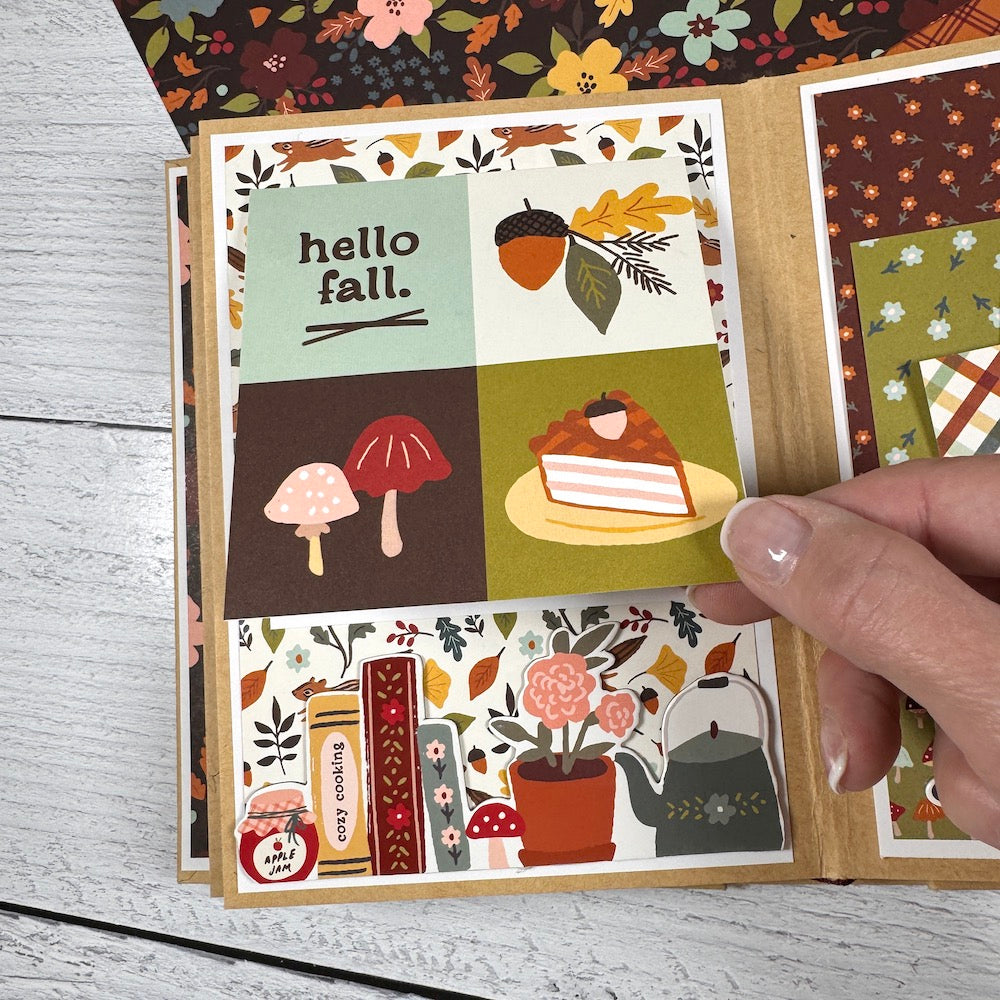 Give Thanks Fall Scrapbook Album Page with flowers, leaves, a pie, mushrooms, and a folding card