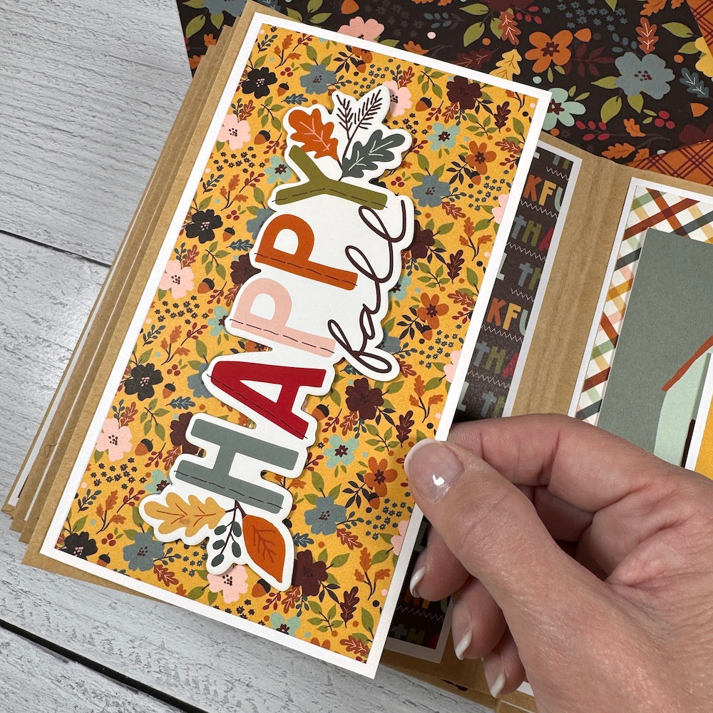 Give Thanks Fall Scrapbook Album Page with gorgeous flowers, leaves, and a fold-out element