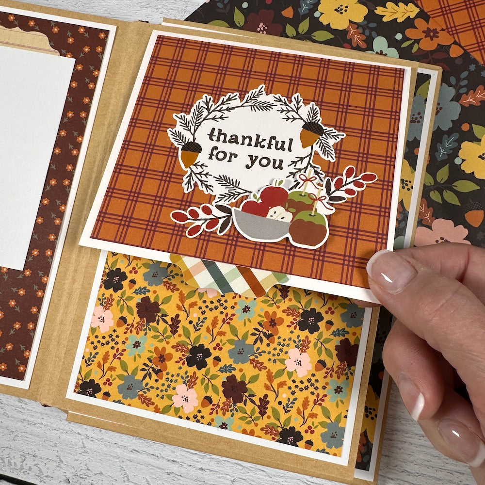 Give Thanks Fall Scrapbook Album Page with flowers, leaves, and a cute folding card