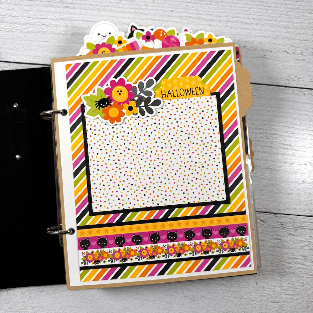 Halloween Scrapbook Album Page with a ghost, flowers, cute cat faces, and a spider