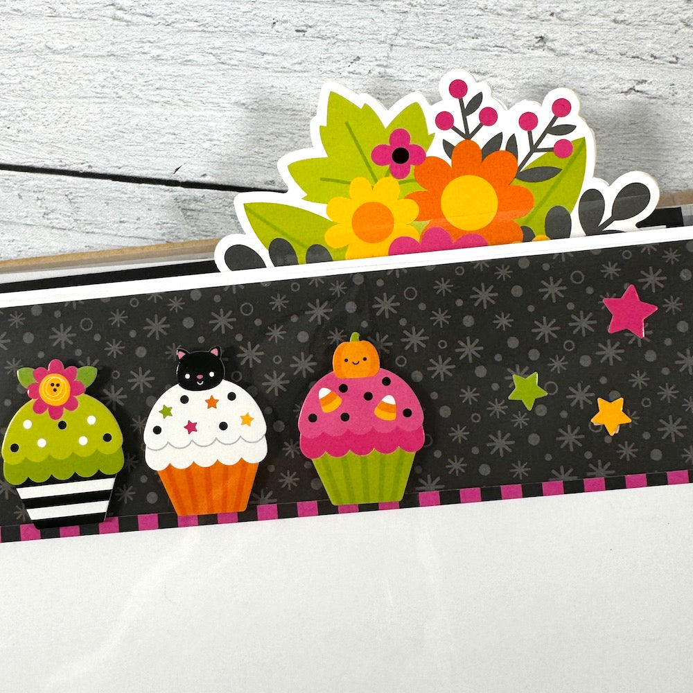 Halloween Scrapbook Album Page with cupcakes, flowers, and stars