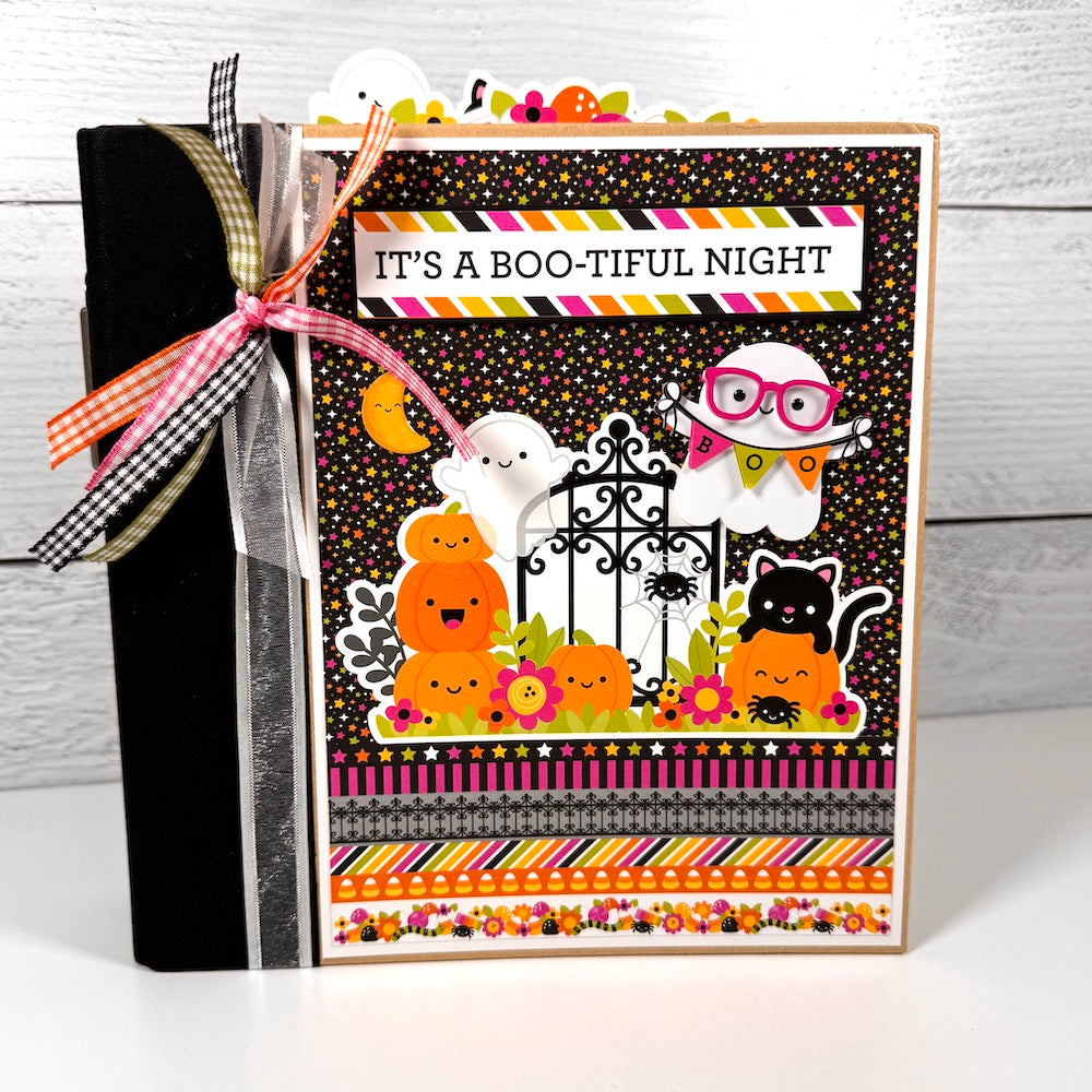 Boo-tiful Night Halloween Scrapbook Album with ghosts, pumpkins, a cat, spider, and stars