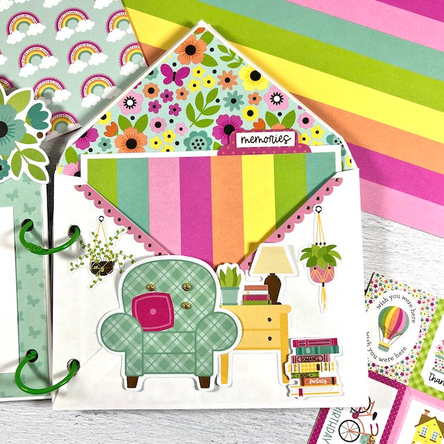 Friends Envelope Scrapbook Album Page with flowers, rainbow stripes, and a cute house items