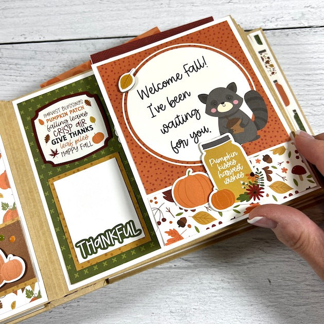 Fall Autumn Memories Scrapbook Album page with a raccoon, pumpkins, and fall leaves