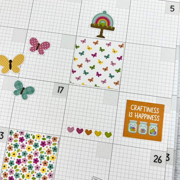 12x12 Monthly Calendar Scrapbook Layout with butteflies, flowers, & hearts