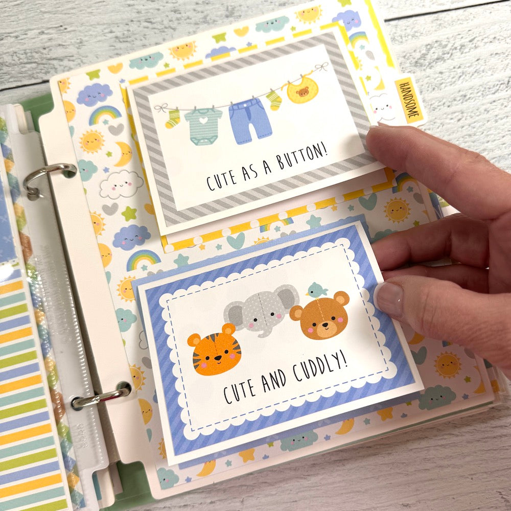 My Baby Boy Scrapbook Album page with 2 folding cards, a bear, a tiger, an elephant, and sweet a baby clothes