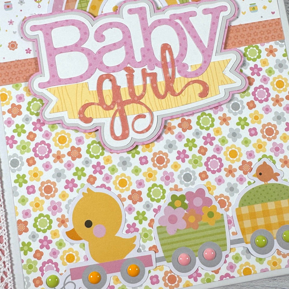 My Baby Girl Scrapbook Album with flowers, a cute duck, a train, and enamel dots