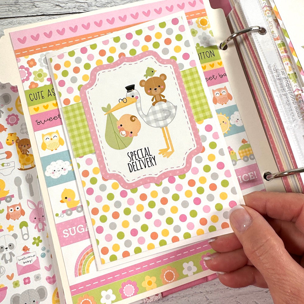 My Baby Girl Scrapbook Album page with a folding card, a stork, a bear, polka dots, and owls