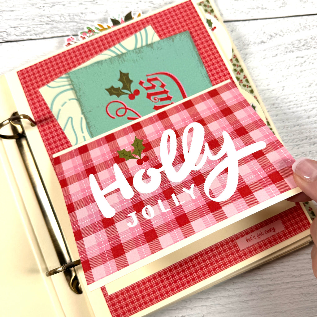 Holly Jolly Days Christmas Scrapbook Album page with a pocket, journaling cards, holly leaves and berries, and cute plaid papers