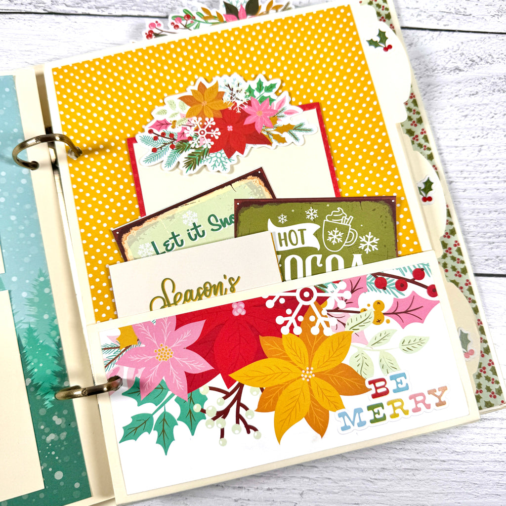 Holly Jolly Days Christmas Scrapbook Album page with a pocket, pretty journaling cards, and colorful poinsettia flowers