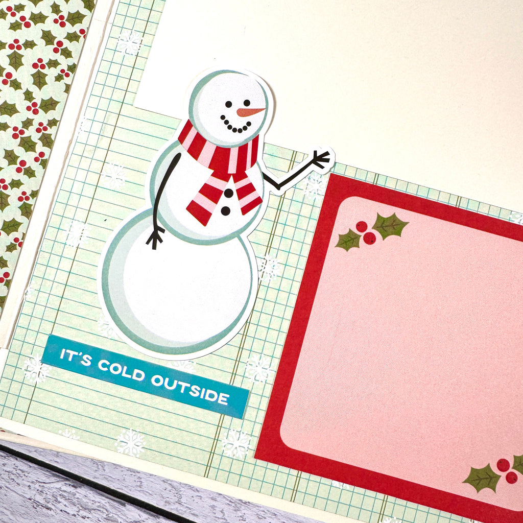 Holly Jolly Days Christmas Scrapbook Album page with a snowman, snowflakes, holly leaves, and berries