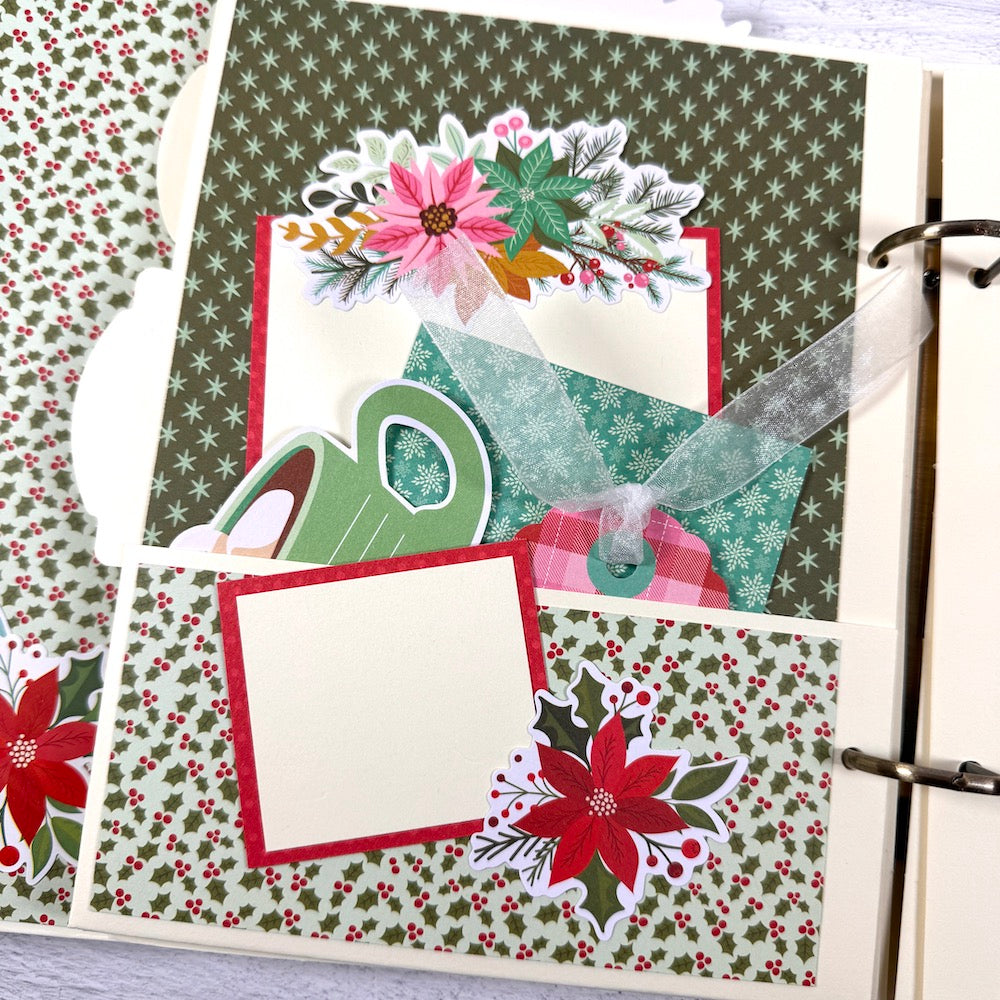 Holly Jolly Days Christmas Scrapbook Album page with a pocket, journaling cards, ribbon, poinsettia flowers, holly leaves, and berries