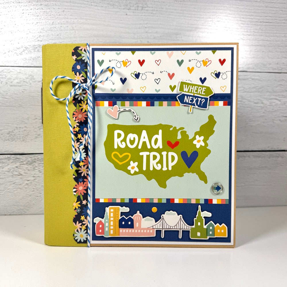 Road Trip Travel Scrapbook Mini Album with a map, flowers, colorful hearts, twine, and enamel brads