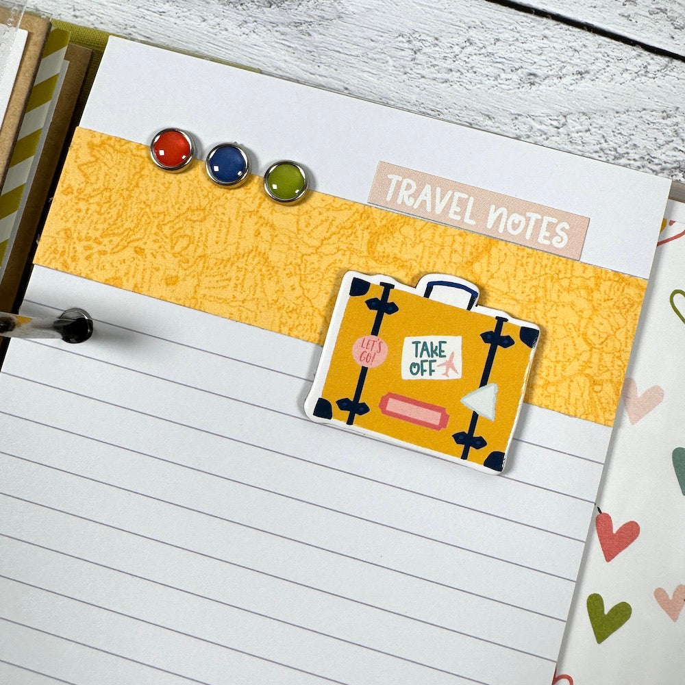 Road Trip Travel Scrapbook Album page with a lined journaling card, a suitcase, and pretty enamel brads