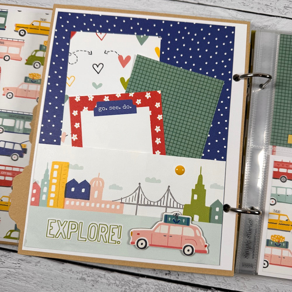 Road Trip Travel Scrapbook Album page with a pocket, a city skyline, a car, and journaling cards