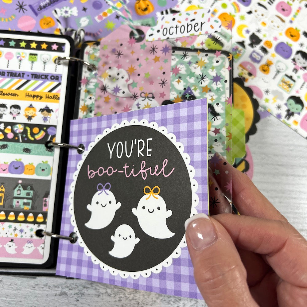 Halloween Scrapbook Album Page with ghosts, candy, stars, and pastel colors