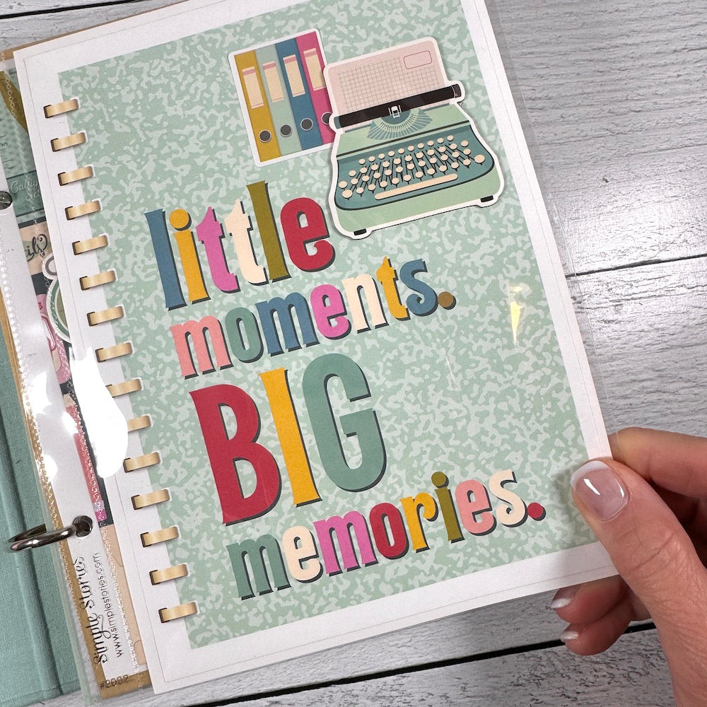 Everyday Life Scrapbook Album Page with a cute typewriter, colorful words, and books