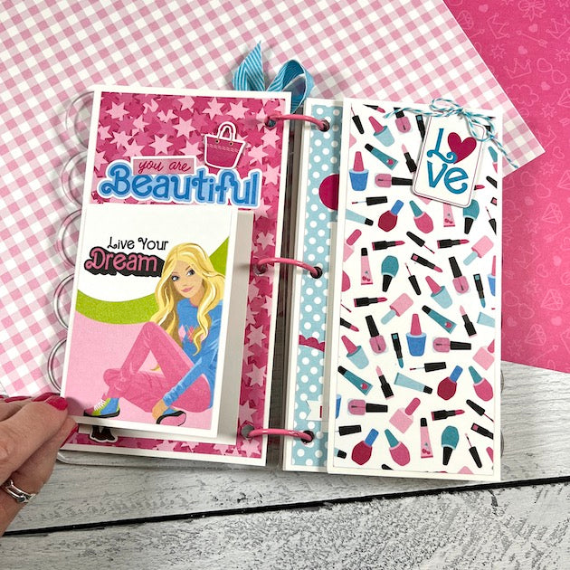 Barbie Themed Scrapbook Album Page with stars, a doll, nail polish, and lipstick