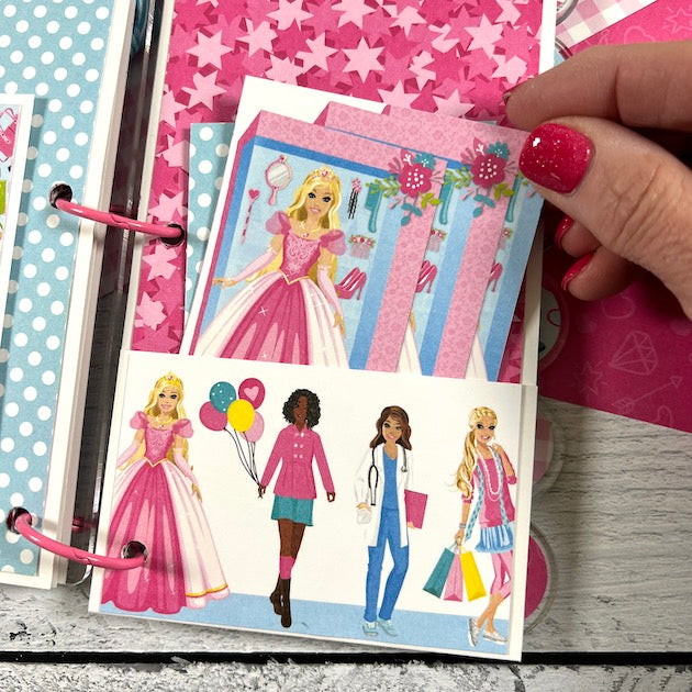 Barbie Themed Scrapbook Album Page with dolls, a pocket, and journaling cards