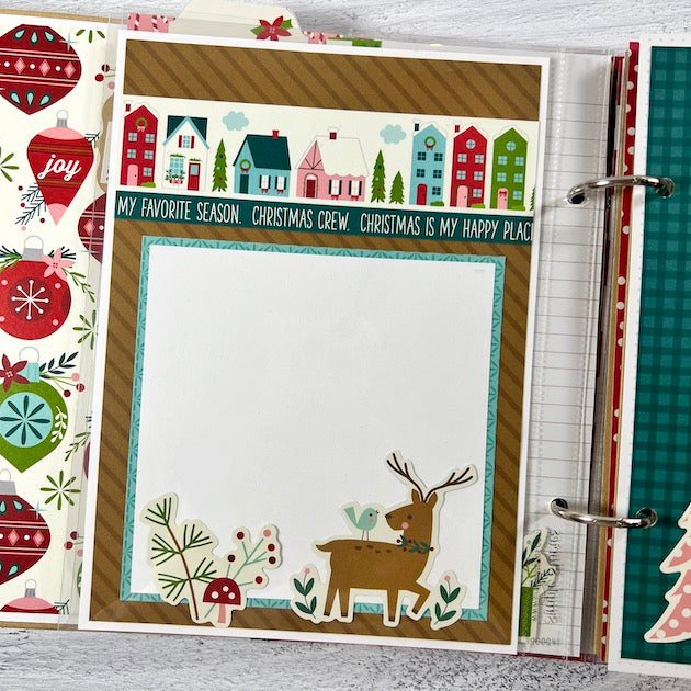 Christmas Scrapbook Album Page with houses, a reindeer, and colorful ornaments