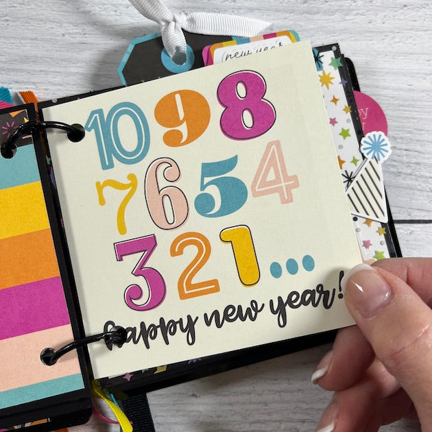 Happy New Year Scrapbook Album page with numbers counting down and rainbow colors