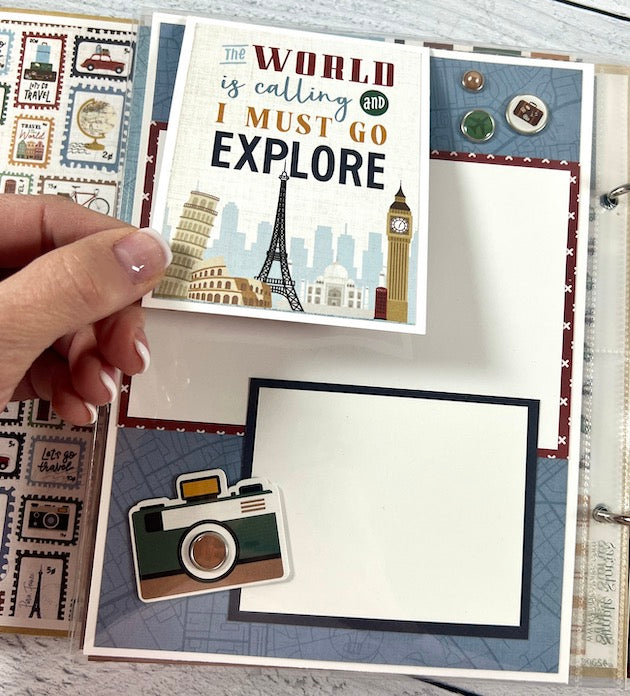 Travel The World Scrapbook Album page with a flip up card, a camera, and cute enamel brads