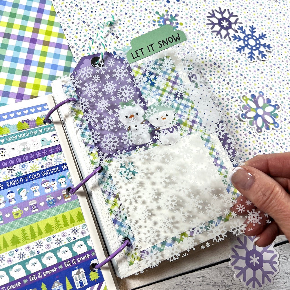 Snow Day Winter Scrapbook Mini Album page made with a pretty snowflake acetate