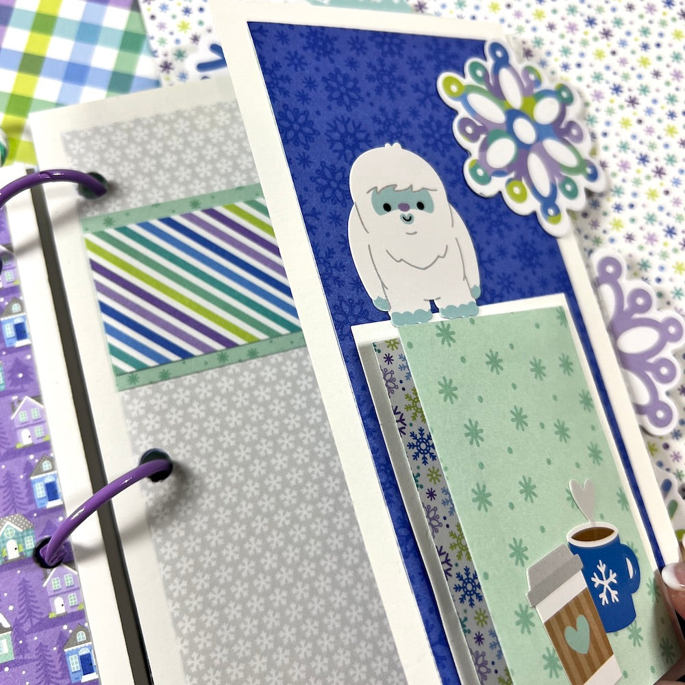 Snow Day Winter Scrapbook Mini Album folding page with snowflakes, a yeti, and a little cup of coffee