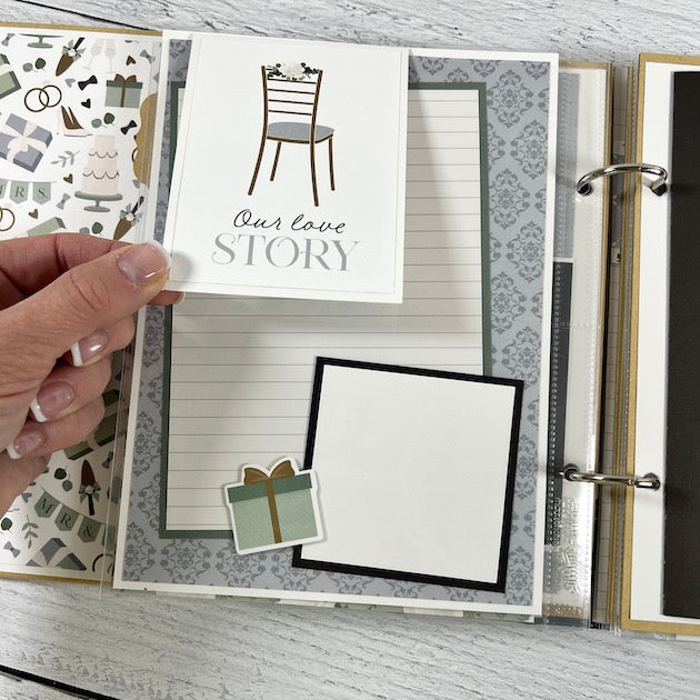 Our Wedding Scrapbook Album page with lined journaling space and folding card for photos