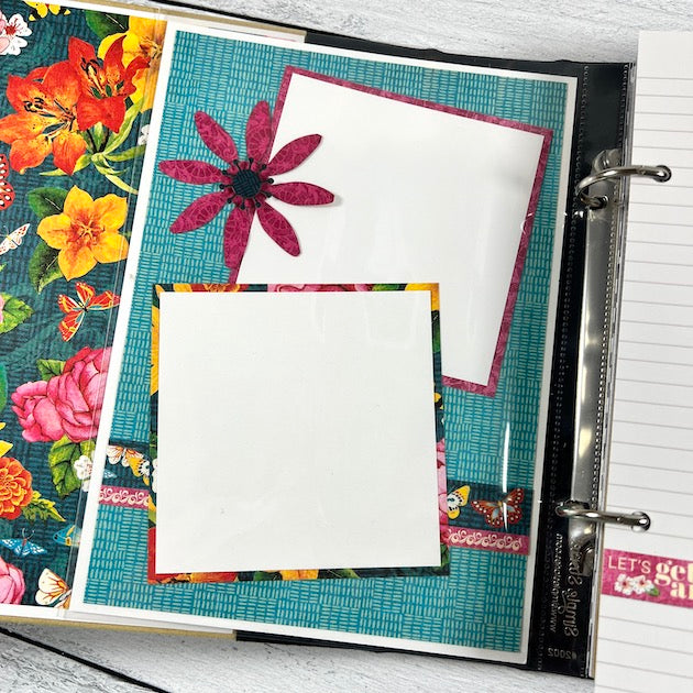 Let's Get Artsy scrapbook album page with vibrant colors, flowers, and 2 photo mats
