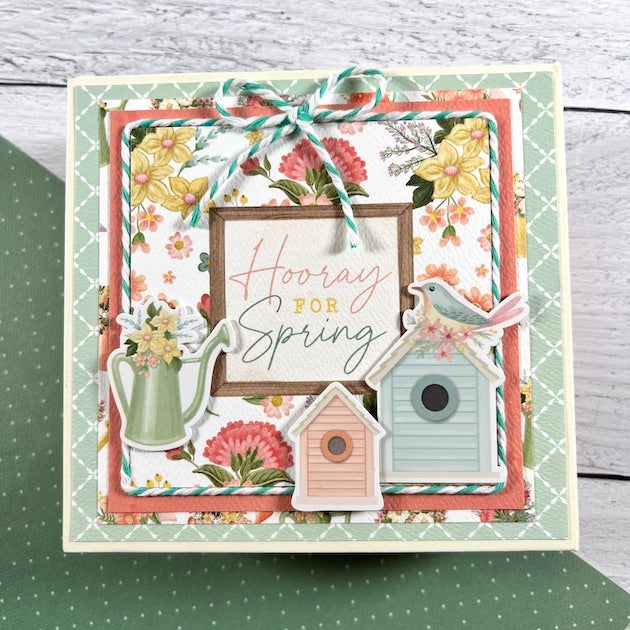 Spring Scrapbook by Artsy Albums with a bird, birdhouses, flowers, and a watering can