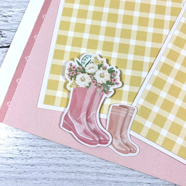 12x12 Spring scrapbook page layout with pretty flowers and cute, pink rain boots