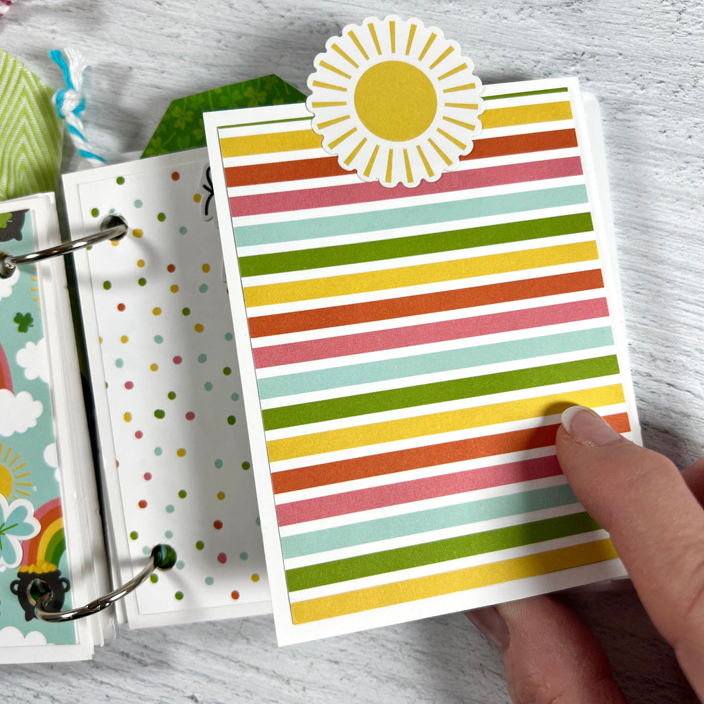 Spring St. Patrick's Day Scrapbook Album page with a sun, colorful stripes, and polka dots