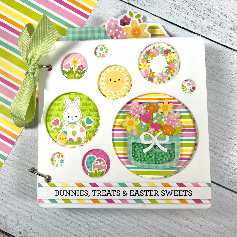 Easter and Spring Scrapbook Mini Album with circle cut-outs, bunnies, flowers, and Easter eggs