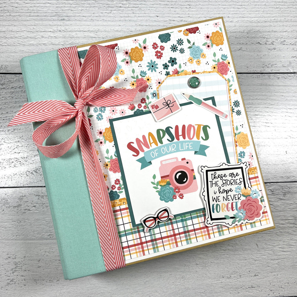 Snapshots of Our Life Scrapbook Album Kit with flowers, cameras, typewriters, & pretty spring colors 