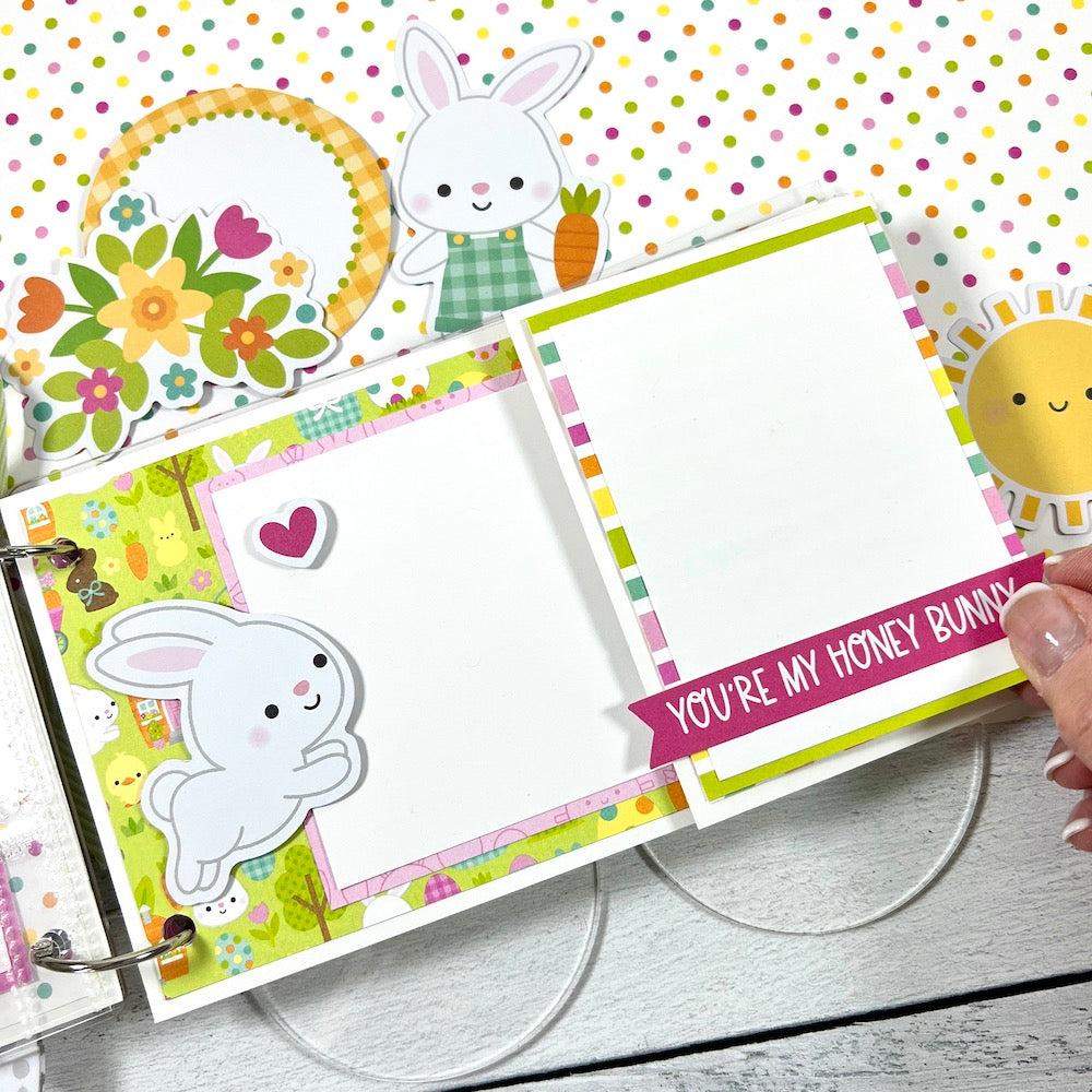 Easter & spring scrapbook album page with bunny rabbits, chicks, carrots, and photo mats
