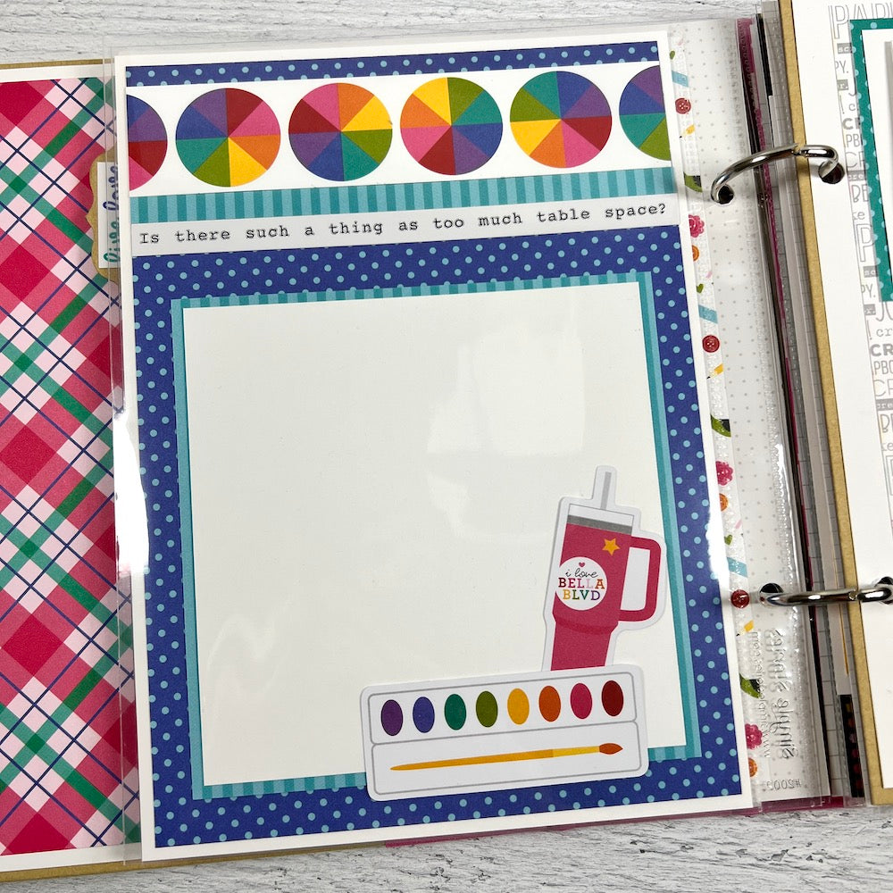 Crafty Friends scrapbook album page with a pretty pink plaid, crafting supplies, and rainbow color wheels