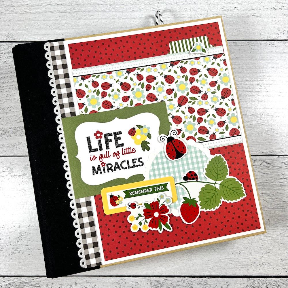 Little Miracles Scrapbook Mini Album with ladybugs, flowers, and strawberries