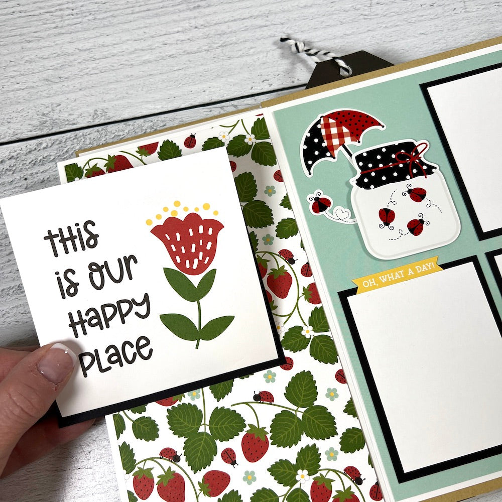 Little Miracles Scrapbook Album Page with strawberries, ladybugs, flowers, and a cute jar