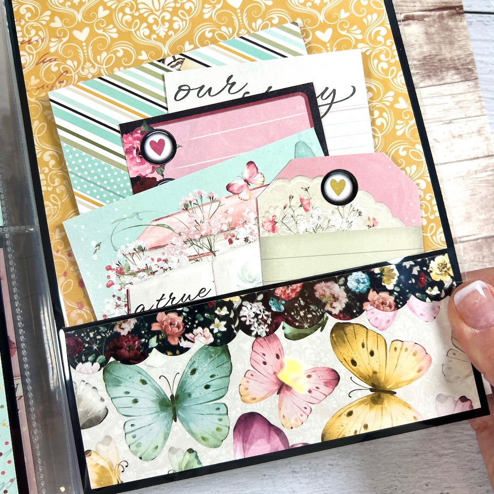 It Was Always You scrapbook album page with a pocket, journaling cards, flowers, and butterflies