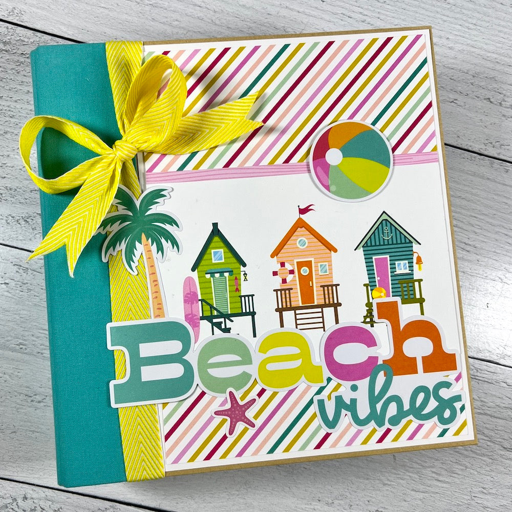 Beach Vibes Scrapbook Album with cottages, palm trees, stripes, and a cute starfish