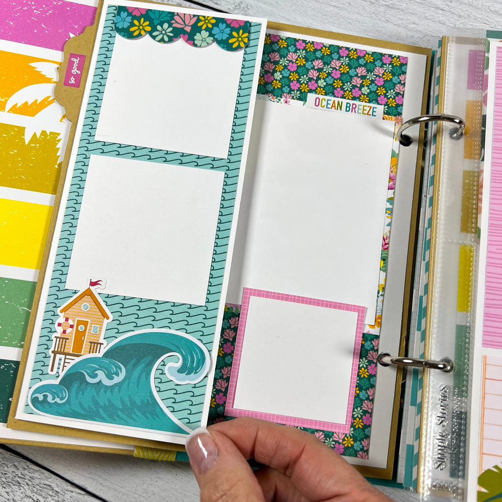 Beach Vibes Scrapbook Album page with waves, tropical flowers, a cottage, and a folding element