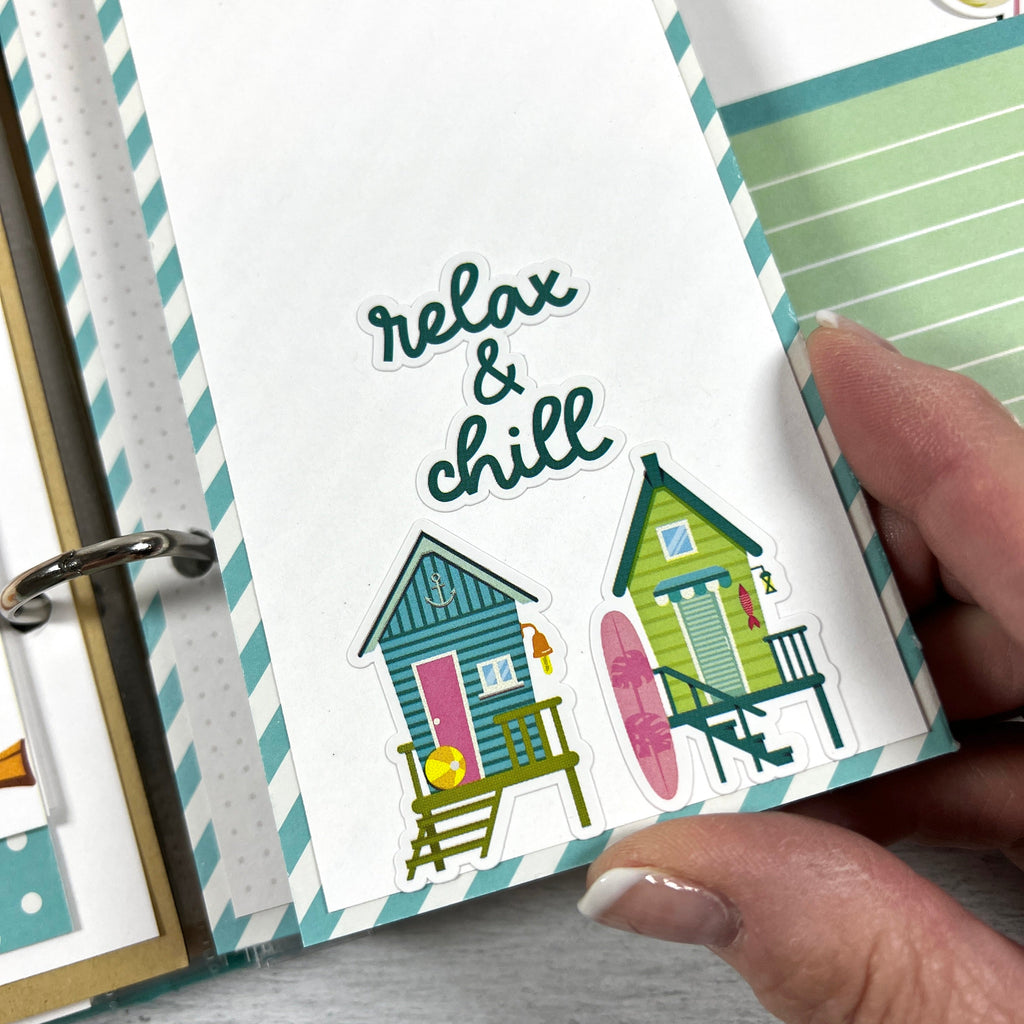 Beach Vibes Scrapbook Album page with two cute cottages, stripes, and a surfboard