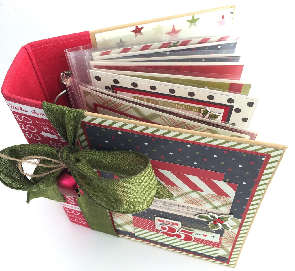 Dec. 25th Christmas Scrapbook Album filled with stars, Santa, holly, stockings, and gifts