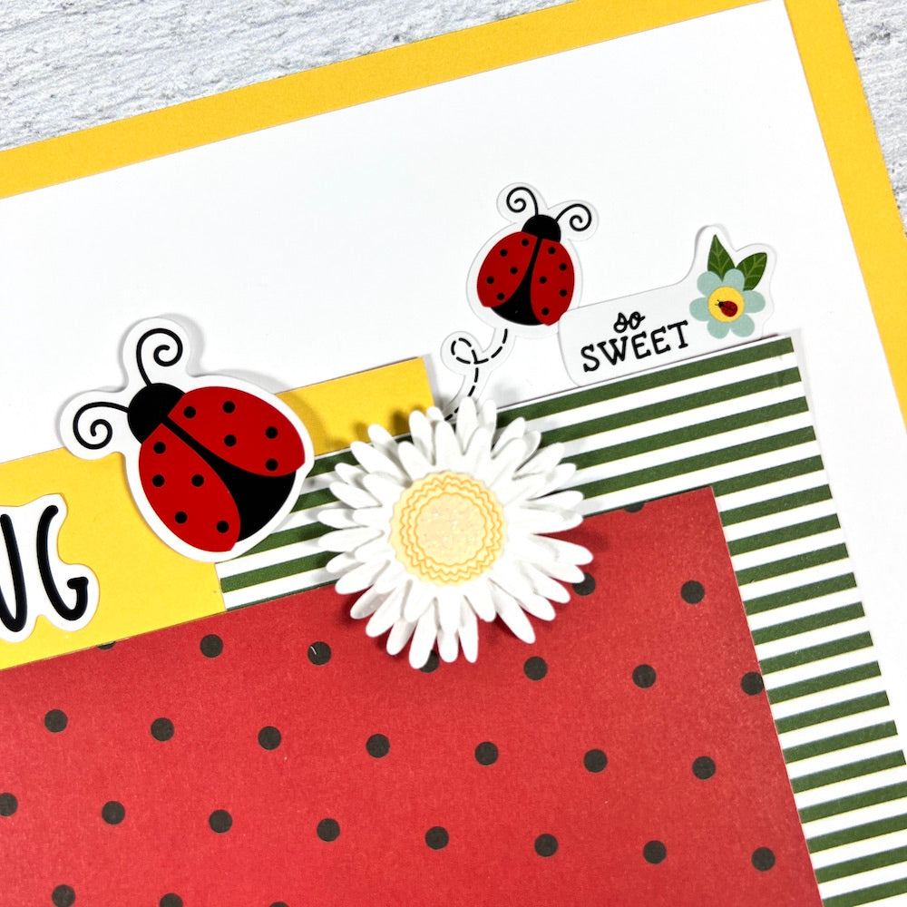 12x12 scrapbook layouts with ladybugs, daisies, and polka dots