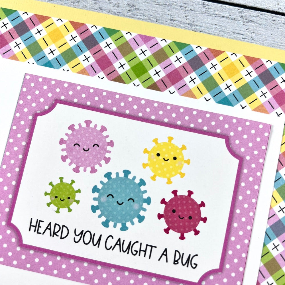 12x12 Medical themed scrapbook page layout with cute germs and a colorful plaid